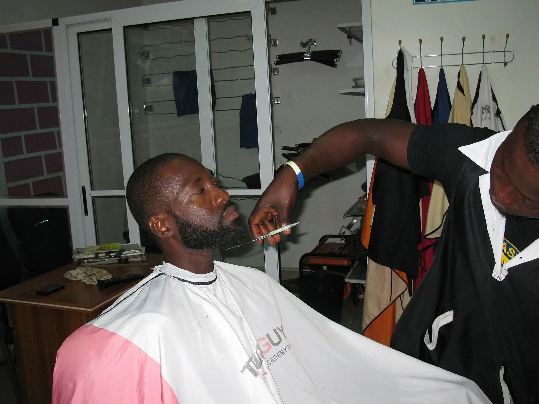 Beard shaping with scissors and comb