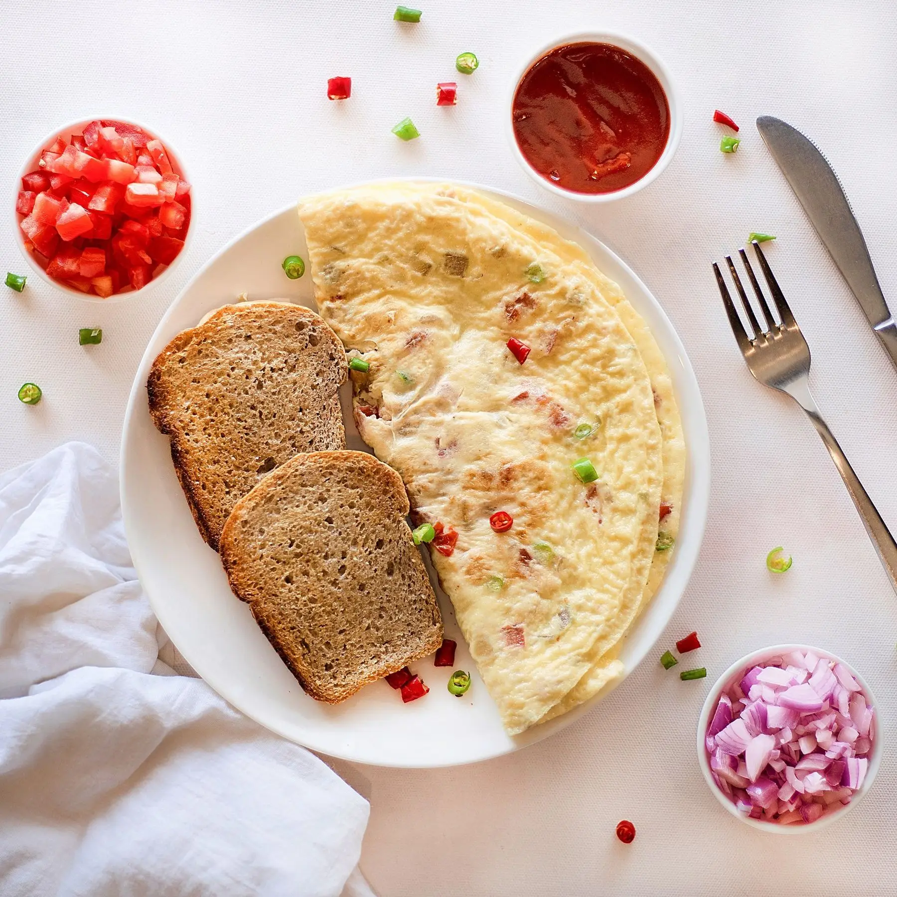 Breakfast: omelette, toast, tomato